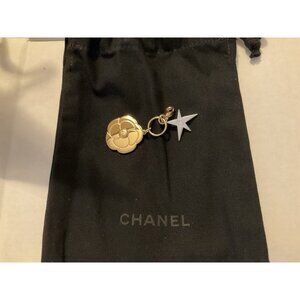 CHANEL Holiday 2025 Camelia Gold & Small Camellia Comet Charm With Black Bag